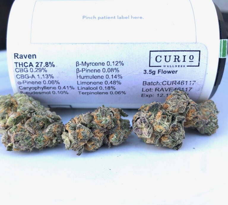 raven by curio terpene and potency label with buds in foreground